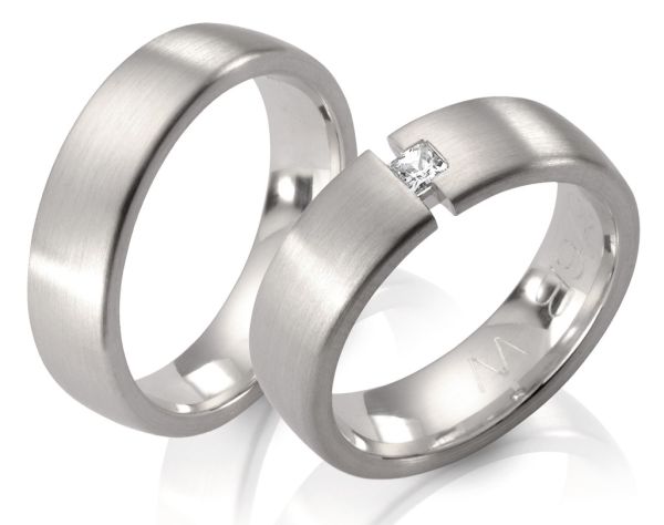 Trauringe mit Prinzess-Diamant in Spannring-Optik